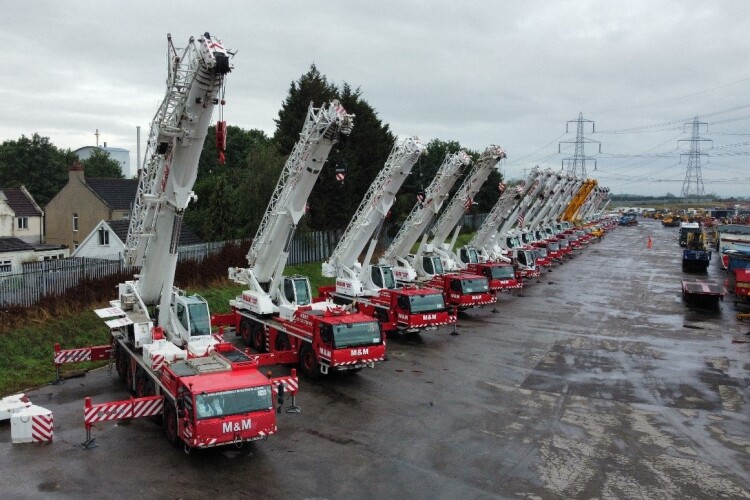 Cranes on parade at the auction site in Leeds