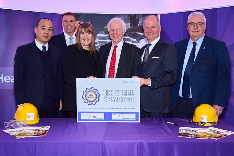 Heathrow Airport chief executive Thomas Woldbye (second from right) signs the UK Steel Charter 