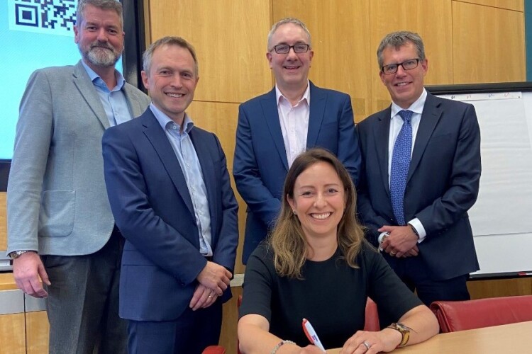 Ready to get their kicks on the A66 are National Highways director Sandie Forte-Gill (seated) and (left to right) Richard French (Kier), Simon Ellison (Costain), Phil Clifton (Balfour Beatty) and Darren James (Keltbray)