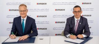 Mace Consult regional MD Christopher Seymour and KSIADC acting CEO Marco Mejia sign contract terms