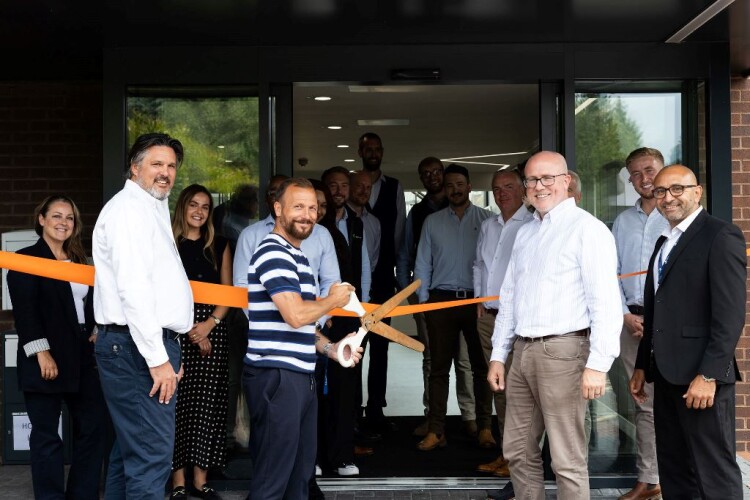 GRS got former professional footballer Jody Morris to cut the ribbon on the new office