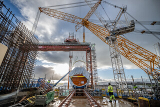 The RPV was lowered onto rails ready for transfer into the reactor building