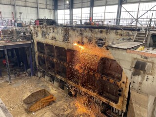 Turbine steam condenser deplanting underway using hot cutting techniques 