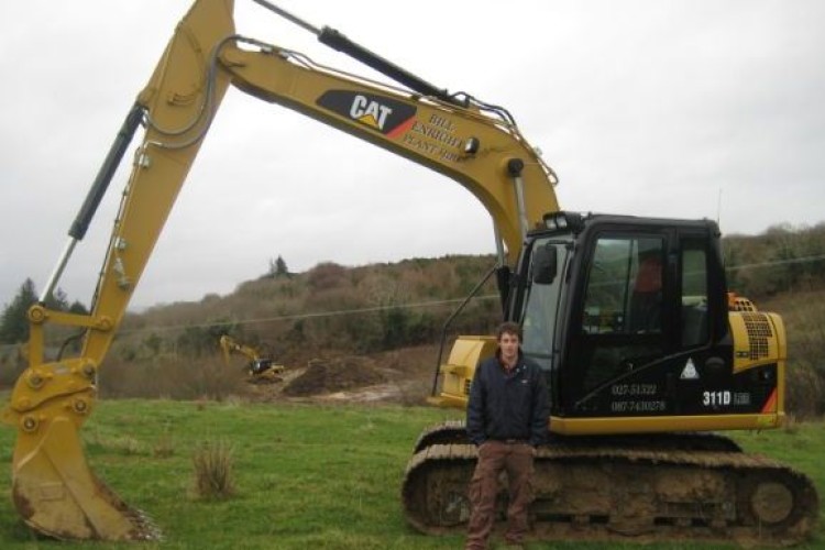 Bill Enright with his new Cat 311 DRR