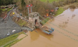 An overhead cable crane and access platform were used to remove the decking 