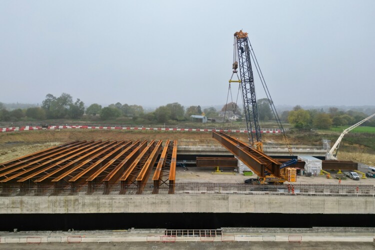 Bridge beams go in to provide a safe corridor for small animals and insects