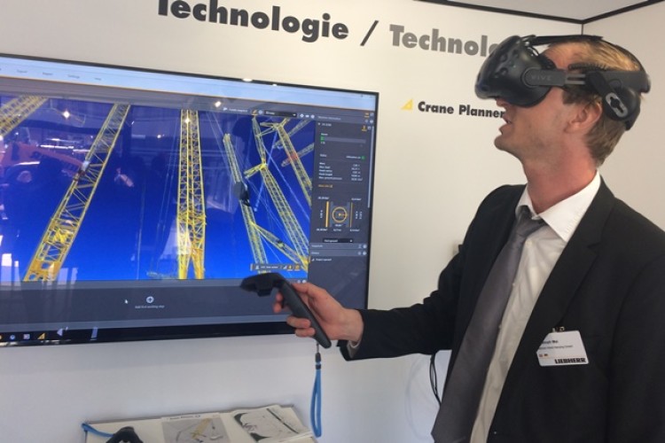 Liebherr product manager Christoph Mai demonstrates the VR technology