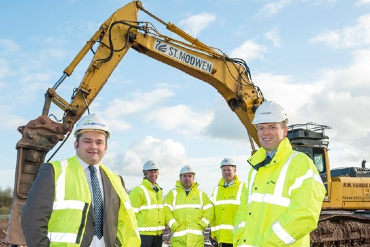 Front, Daniel Le Neveu (left) of Persimmon and Mike Murray of St Modwen. Behind, l-r: Nick Whittingham (St Modwen), David McGing (Persimmon) and Mark Batchelor (St Modwen)