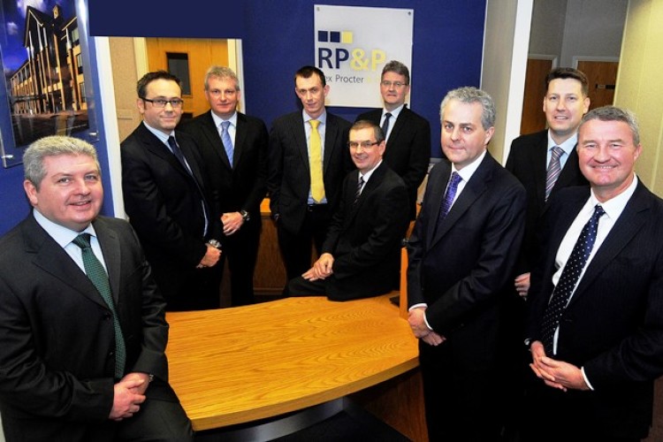 The executive board of the merged Rex Procter & Partners.  Left to right are Gerry McGeough, Ian Tomlinson, Mark Cooper, Alex Blenard, Joe Deegan, John Crowther, Andrew Cooper, Daren Chessun and Paul Mackie.