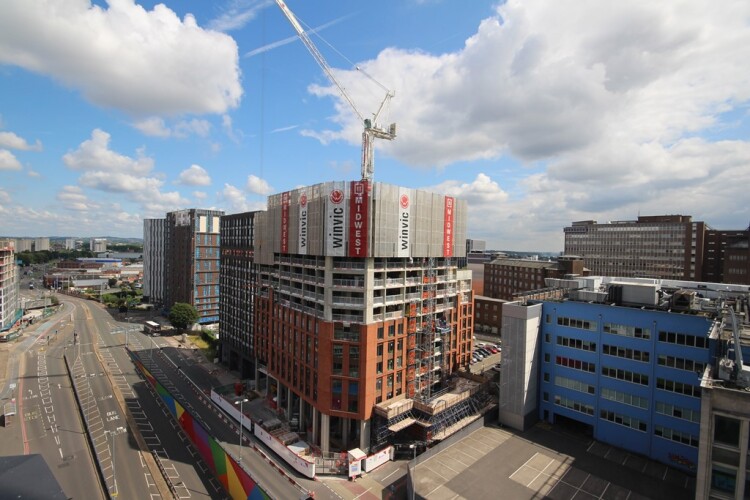 The Potain crane at Crown Place Birmingham is being operated from below