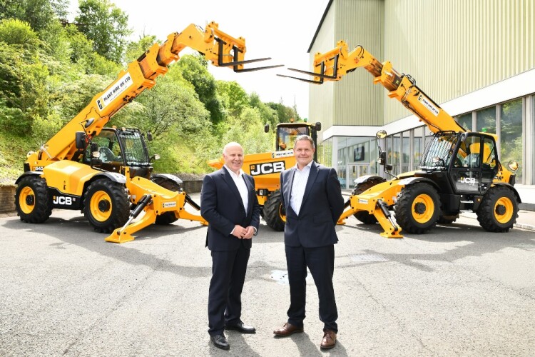 Plant Hire UK managing director Graham Jones (right) with JCB chief operating officer Mark Turner and some of the new machines