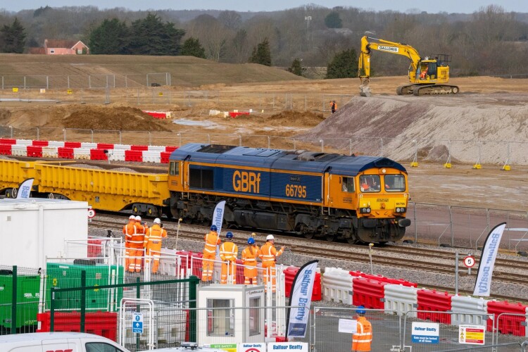 The first goods train arrives at Sizewell, bearing the gift of aggregate