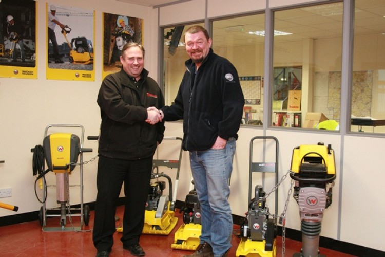 SM Plant&rsquo;s Simon Milligan (right) with Karl Severn of Construct Equip