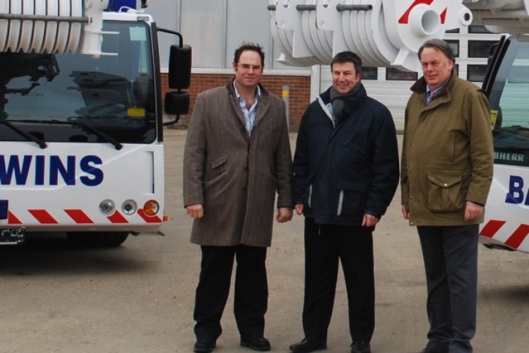 Wayne Baldwin (left) with Liebherr GB managing director Richard Everist (centre) and Baldwins&rsquo; sales director John Spillings (right)