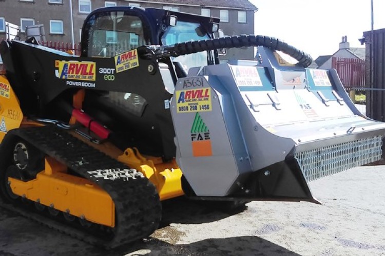 Arvill's new skid steer loader with FAE crusher attachment