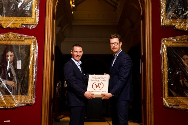 Gilbert-Ash managing director Ray Hutchinson (left) is handed a plaque by National Portrait Gallery director Nicholas Cullinan