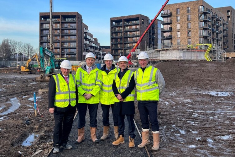 From left to right on site are Weston Homes chairman Bob Weston, divisional sales director Sean Ruane and project manager Weston Homes Liam Fennessy, with estate agent Tom Stevenson and Weston&rsquo;s regional construction director Derek Cook